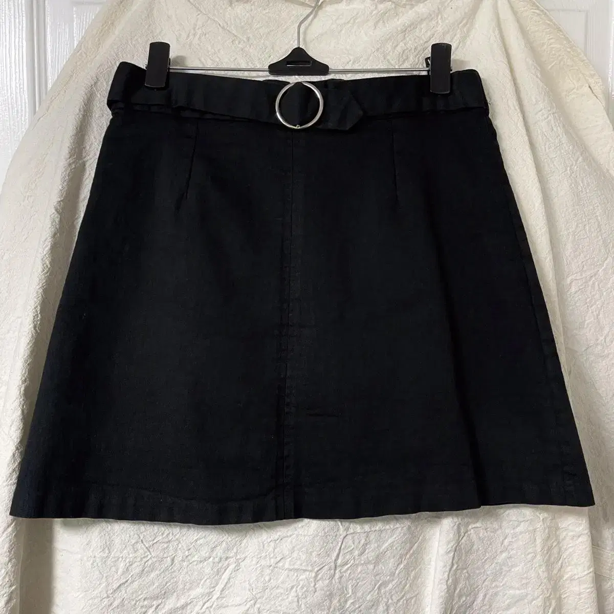 A-line black miniskirt with a belt