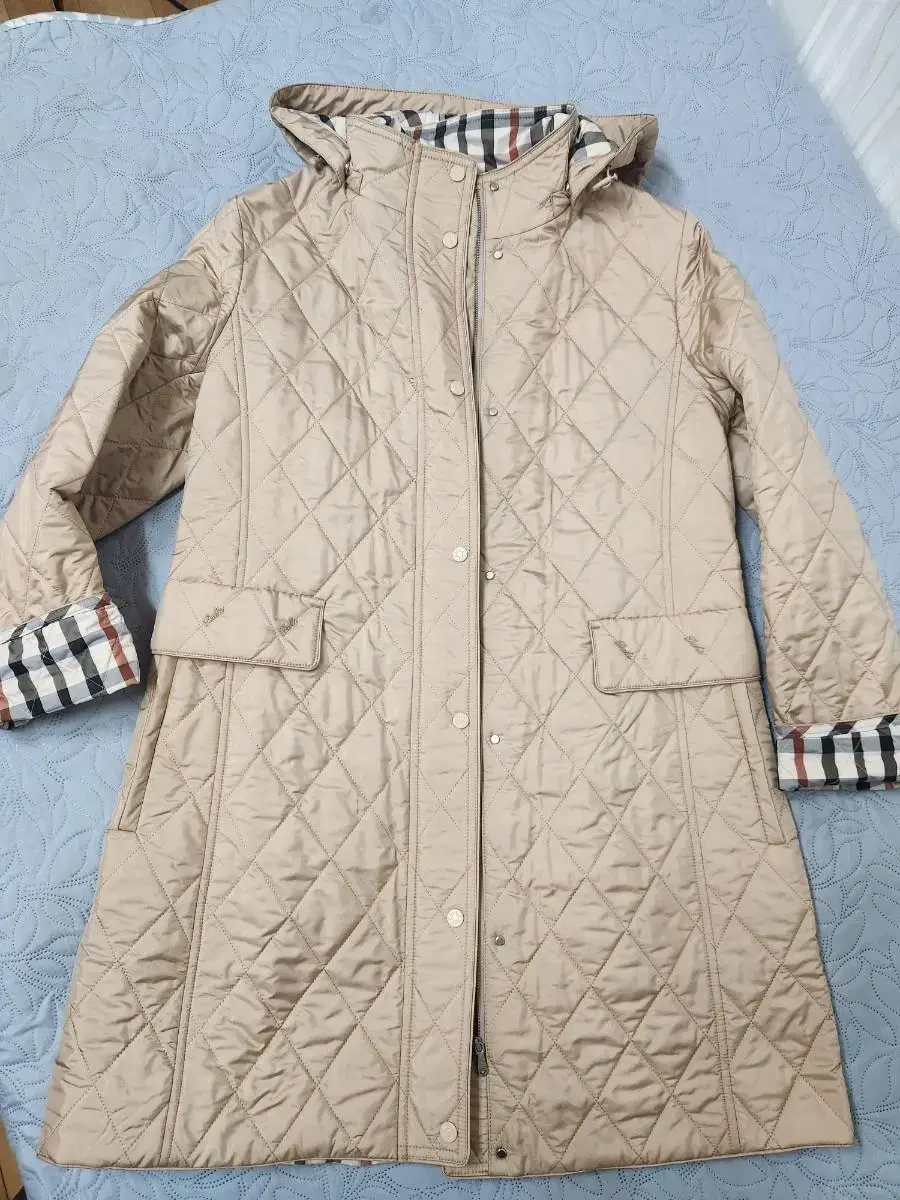 Branded mid-season quilted coat55 to slim66