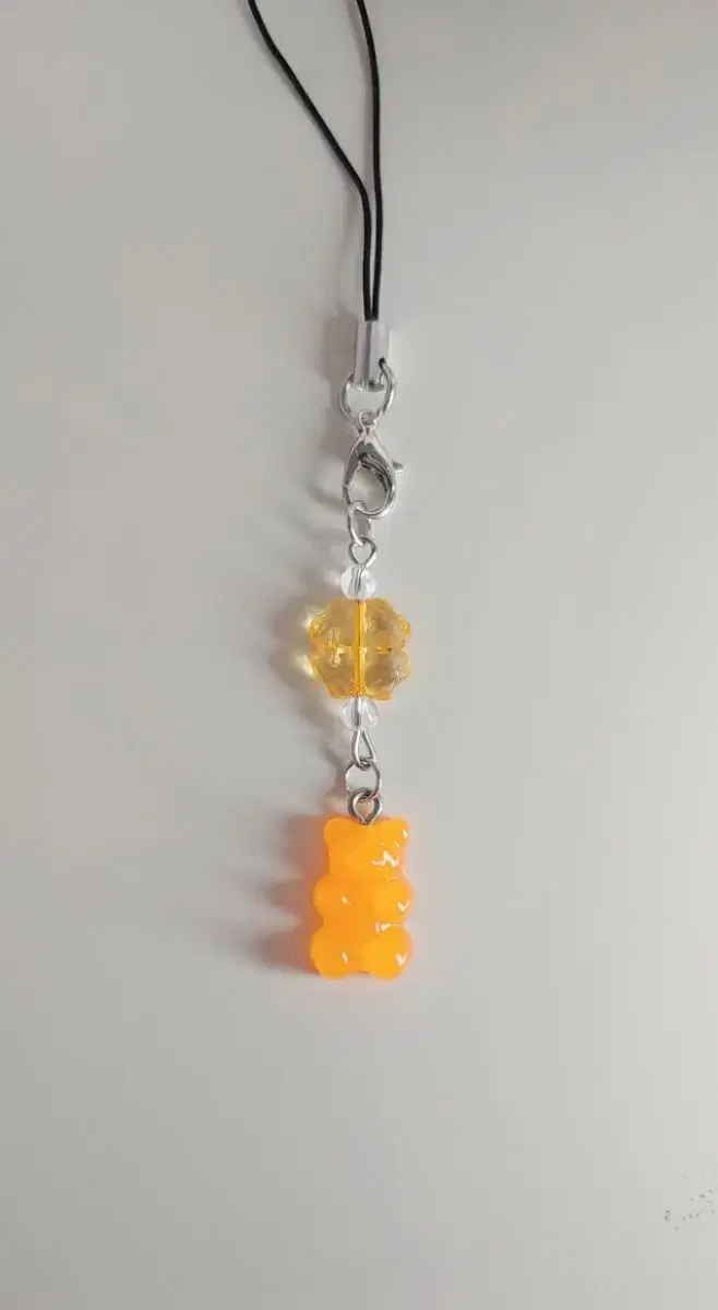 Orange Haribo four-leaf clover beaded keyring