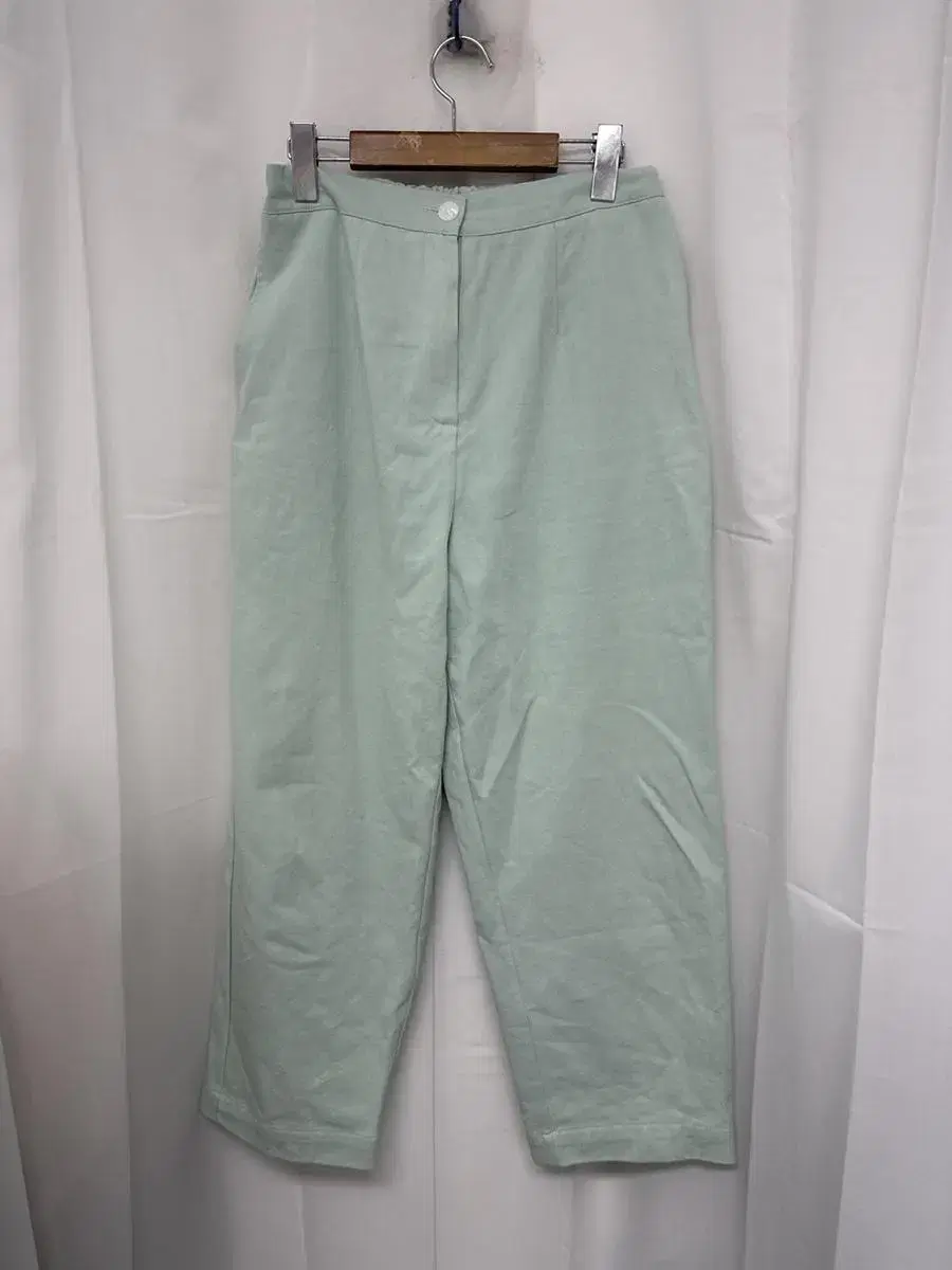 Mint-colored banded pants