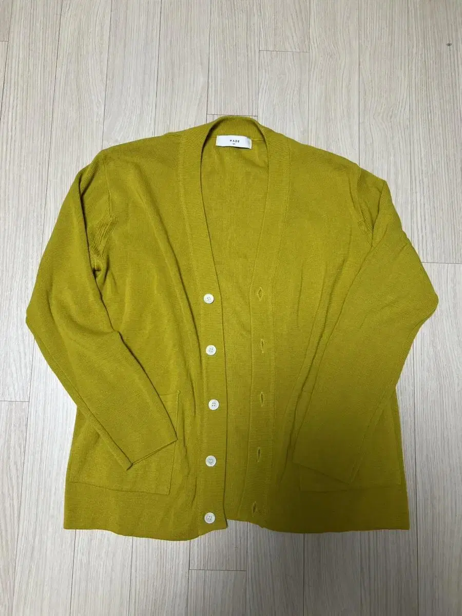 Mustard-colored cardigan