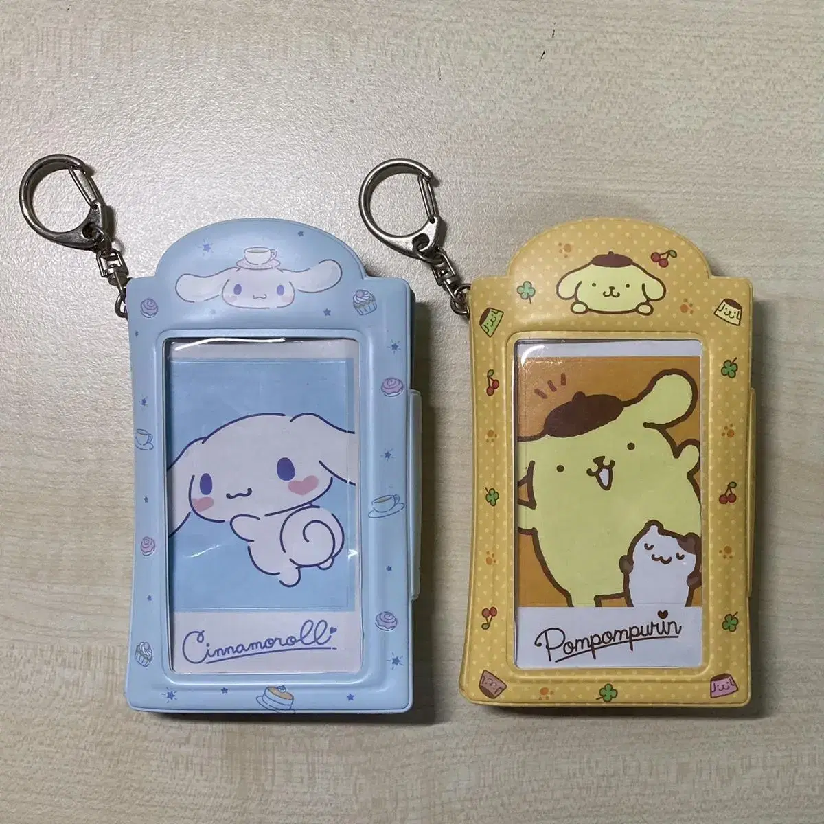 San Rio Cinnamon Roll Pompompurin photocard holder I'm selling my keychain!