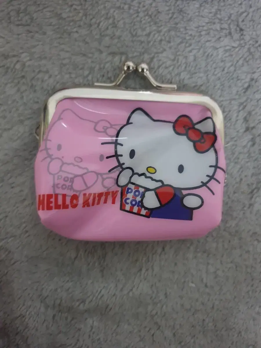 [Old-fashioned phrase] Kitty's coin purse