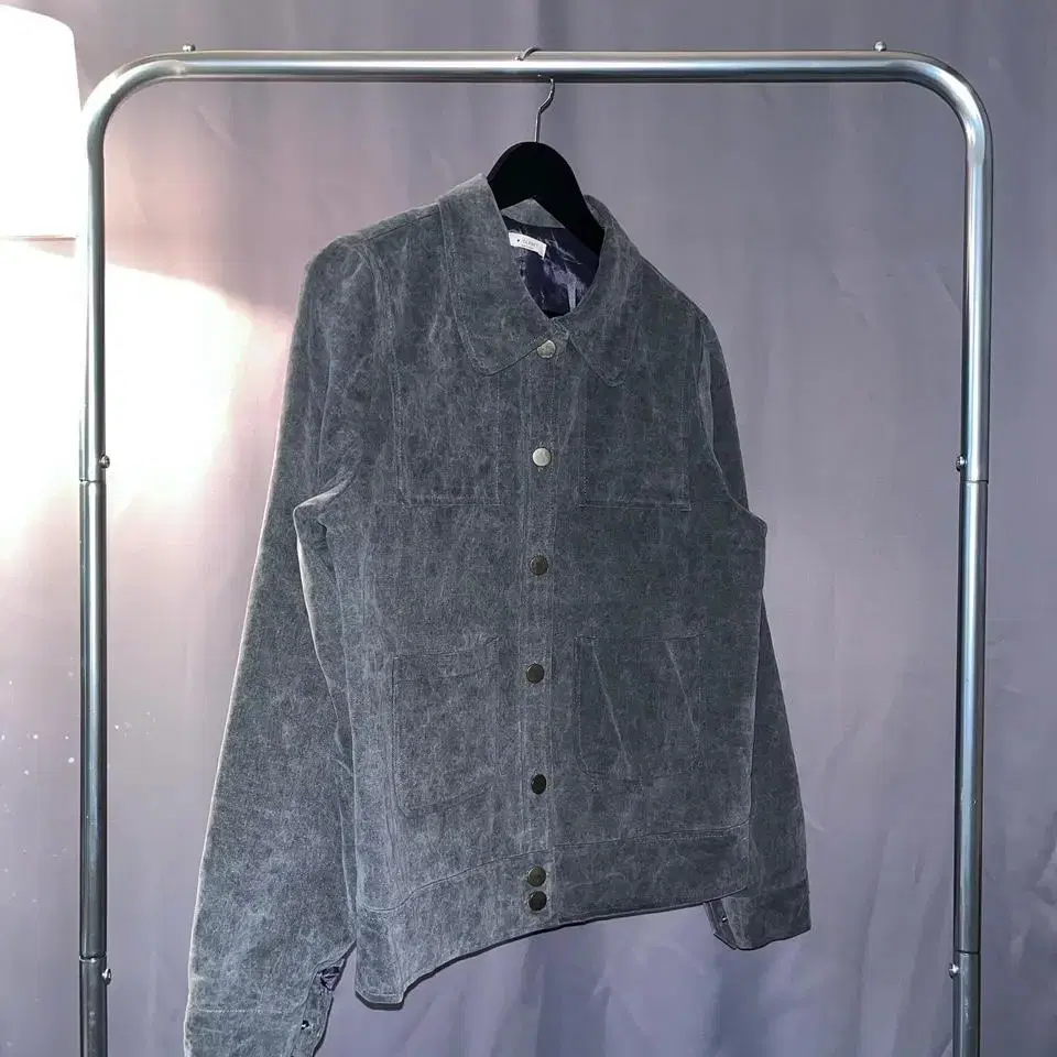 Charcoal washed short jacket.