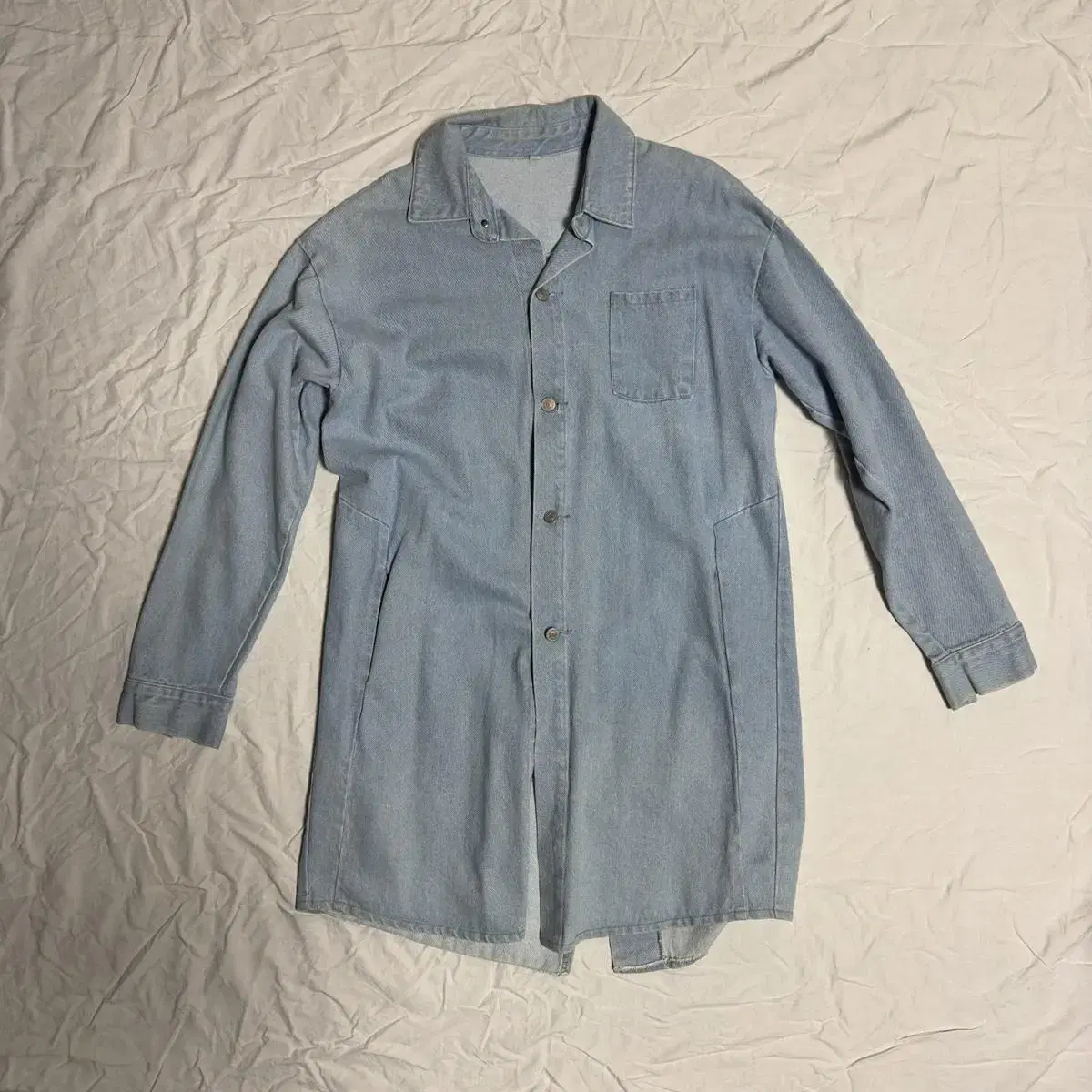 Sell long light blue denim shirt