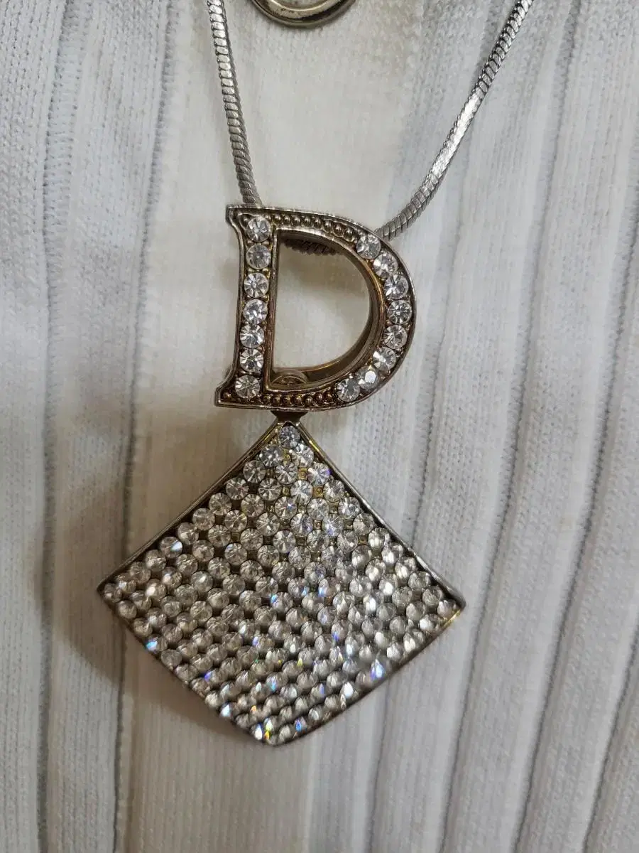 Dior pendant necklace and bold earrings new for $30,000