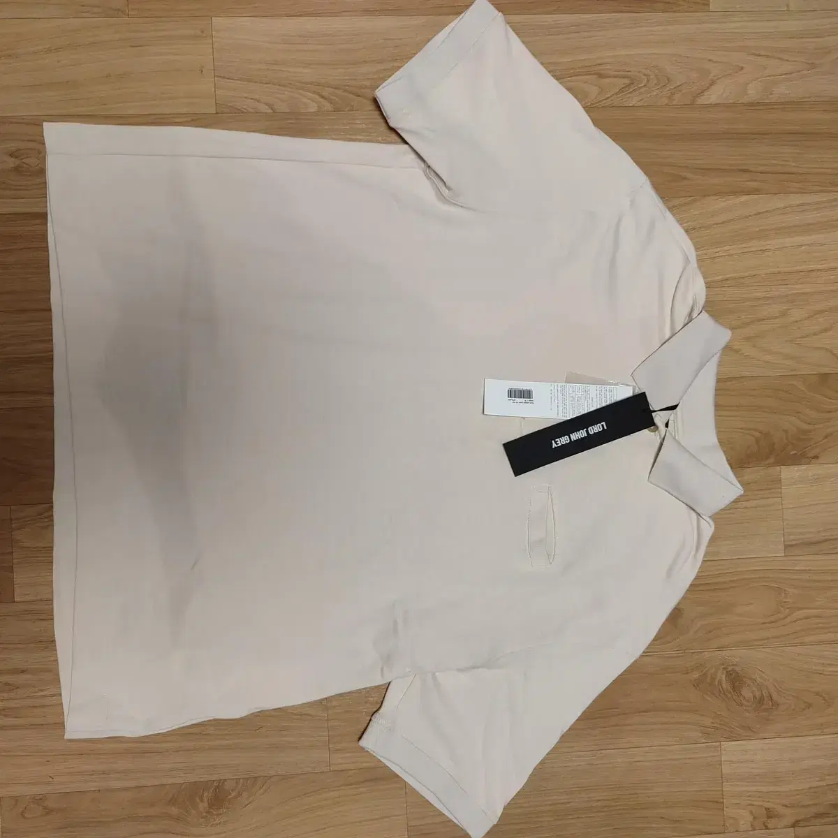 로드존그레이 Back pleats polo tee cream