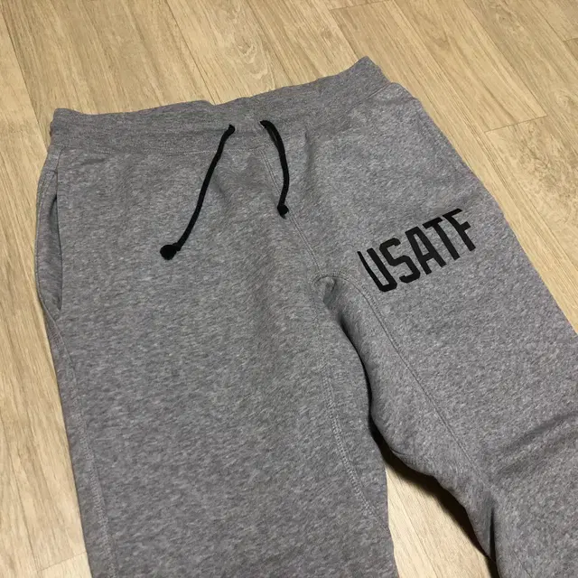 [M] 나이키 USATF 커프 팬츠 그레이