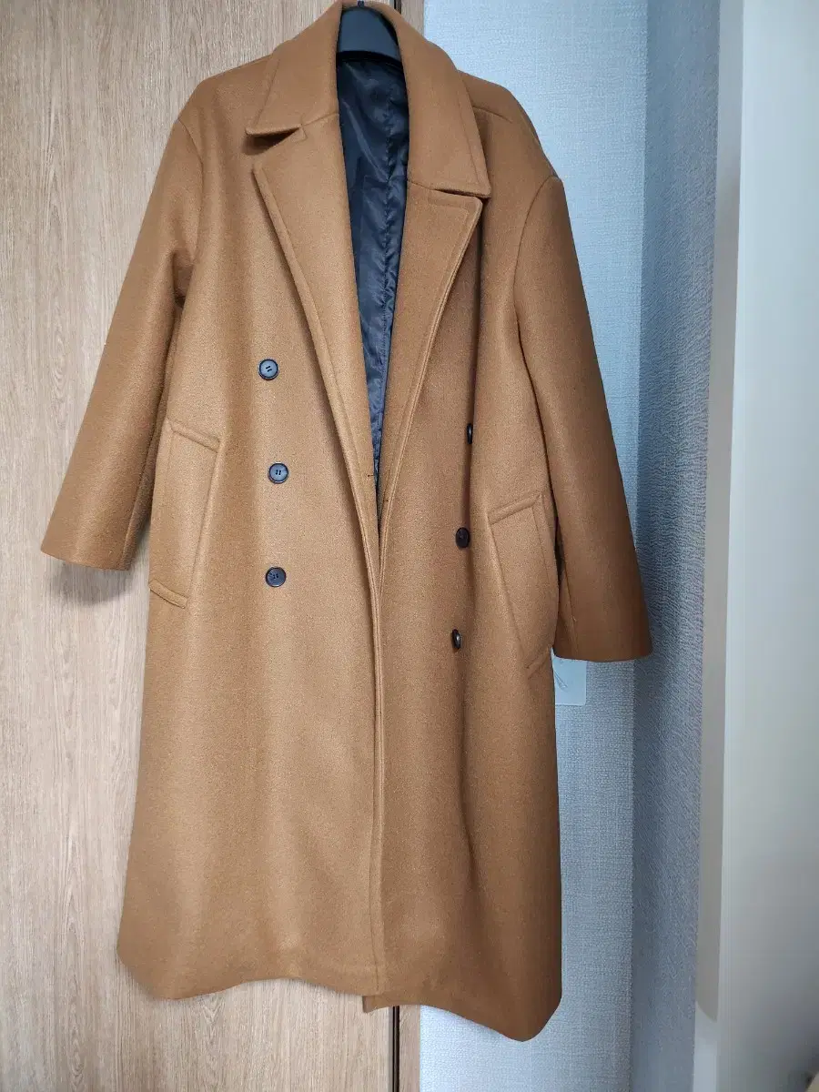 Man-in-store camel coat