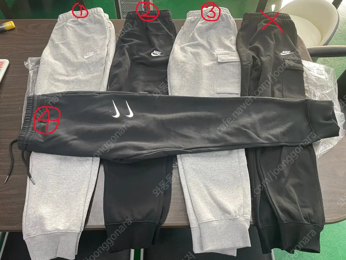 Nike sweatpants sell cheap.