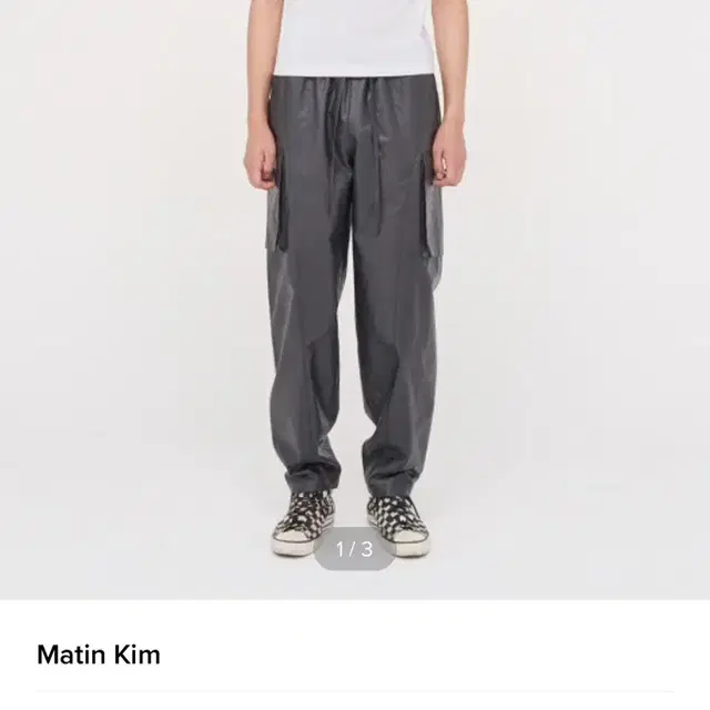 마뗑킴 COATING CARGO PANTS IN BLACK