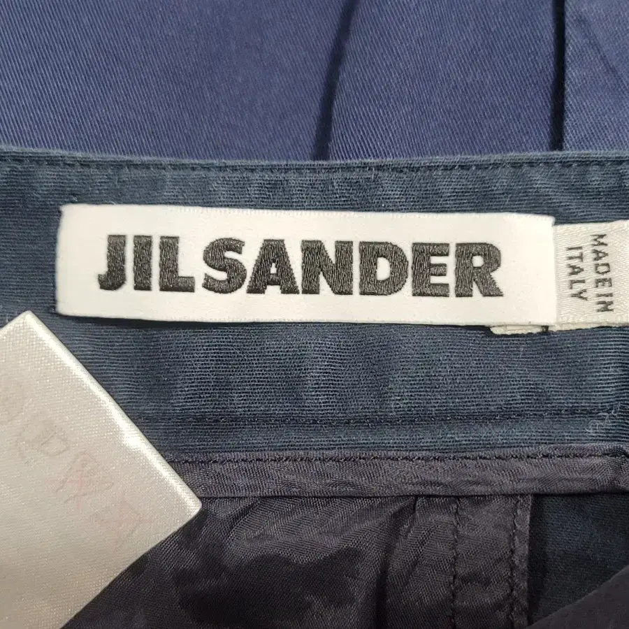 JILSANDER 질샌더 여성 8부 스판 면바지