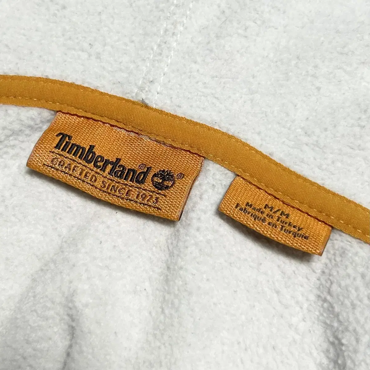 [ M ] Timberland 팀버랜드 오트밀 후리스 반집업 후드티