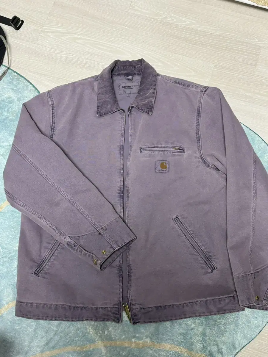 I'm selling the Calhart Detroit Jacket, size L, mauve.