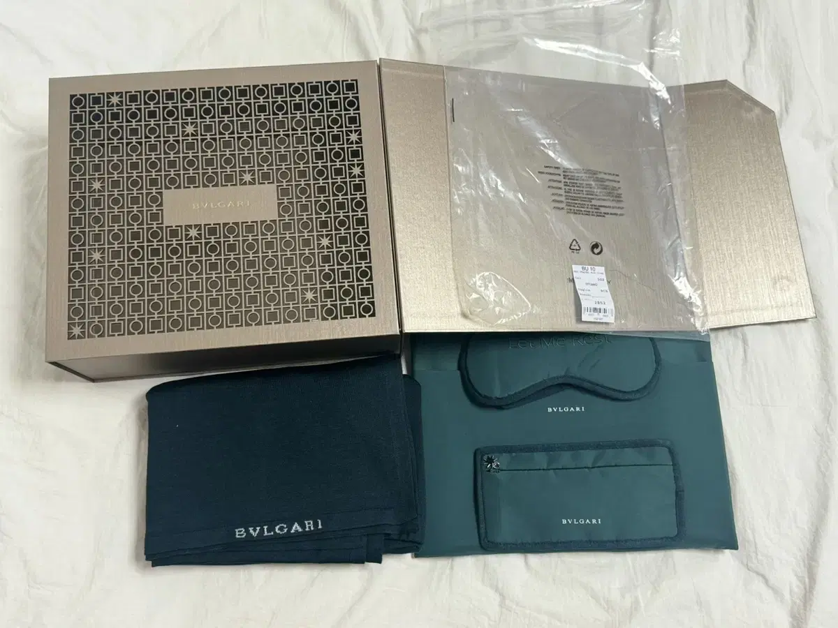 Bulgari eye patch, blanket, and mini clutch set