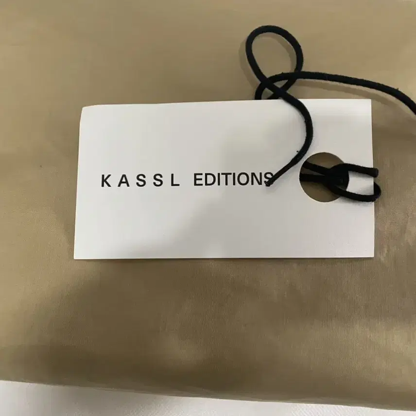 카슬에디션 KASSL EDITION 패딩 캔버스클러치_Brown colo