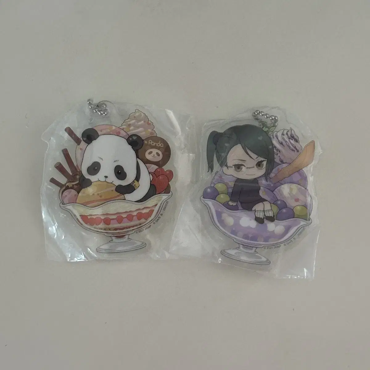 Zuu Spinning Parfait acrylic keyring - Panda Zen in Maki