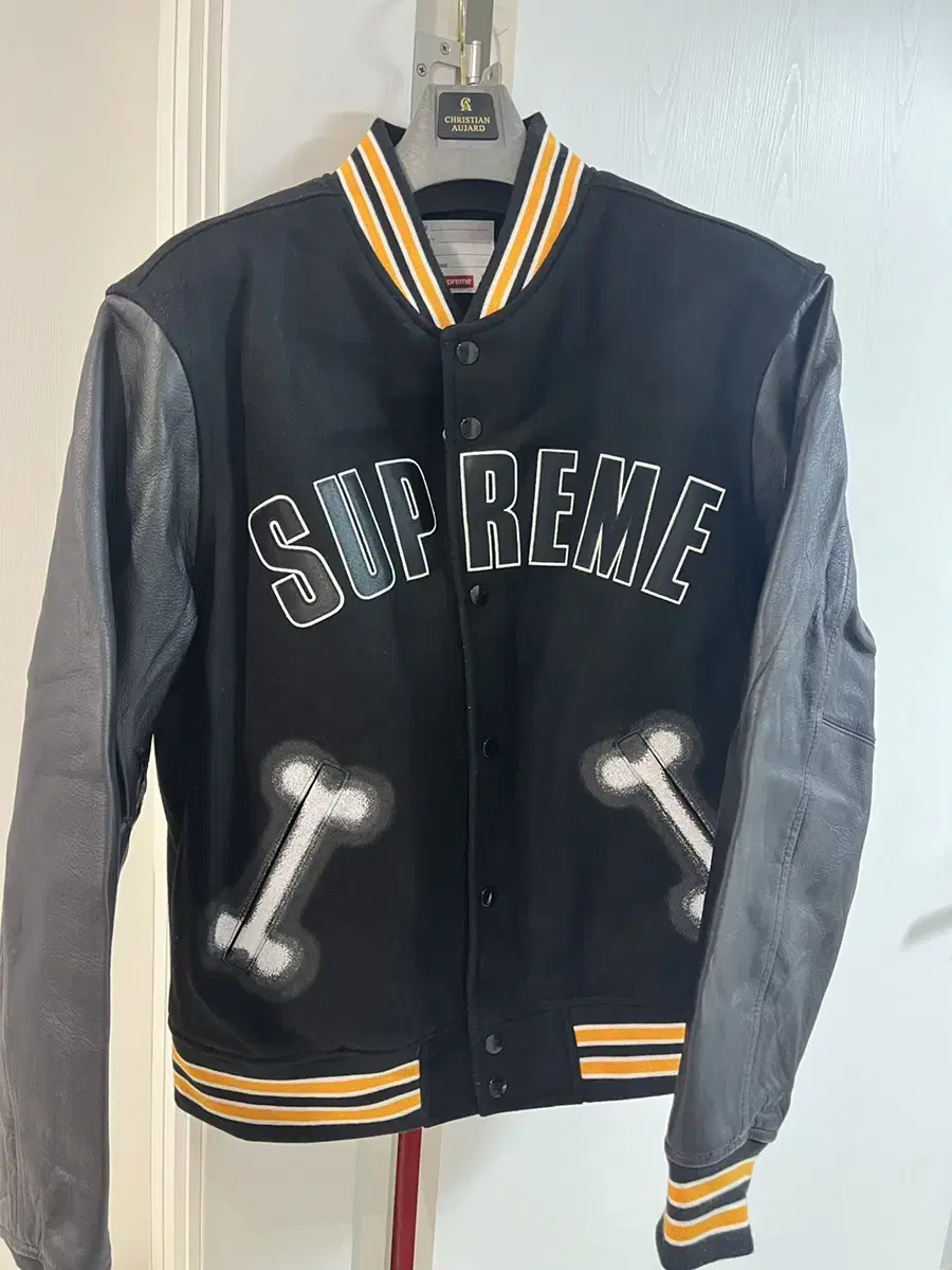 FW18 Supreme Bone Varsity Jacket in Black