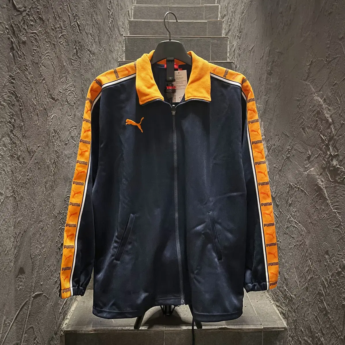 Puma Jersey Track Top Jacket Navy with Orange Logo Stripe at Back