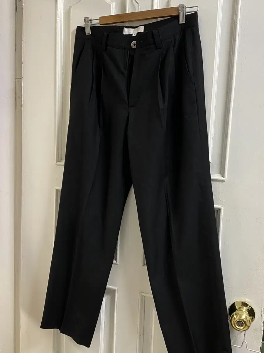 Two pairs of Chin Down Slacks Traverse S