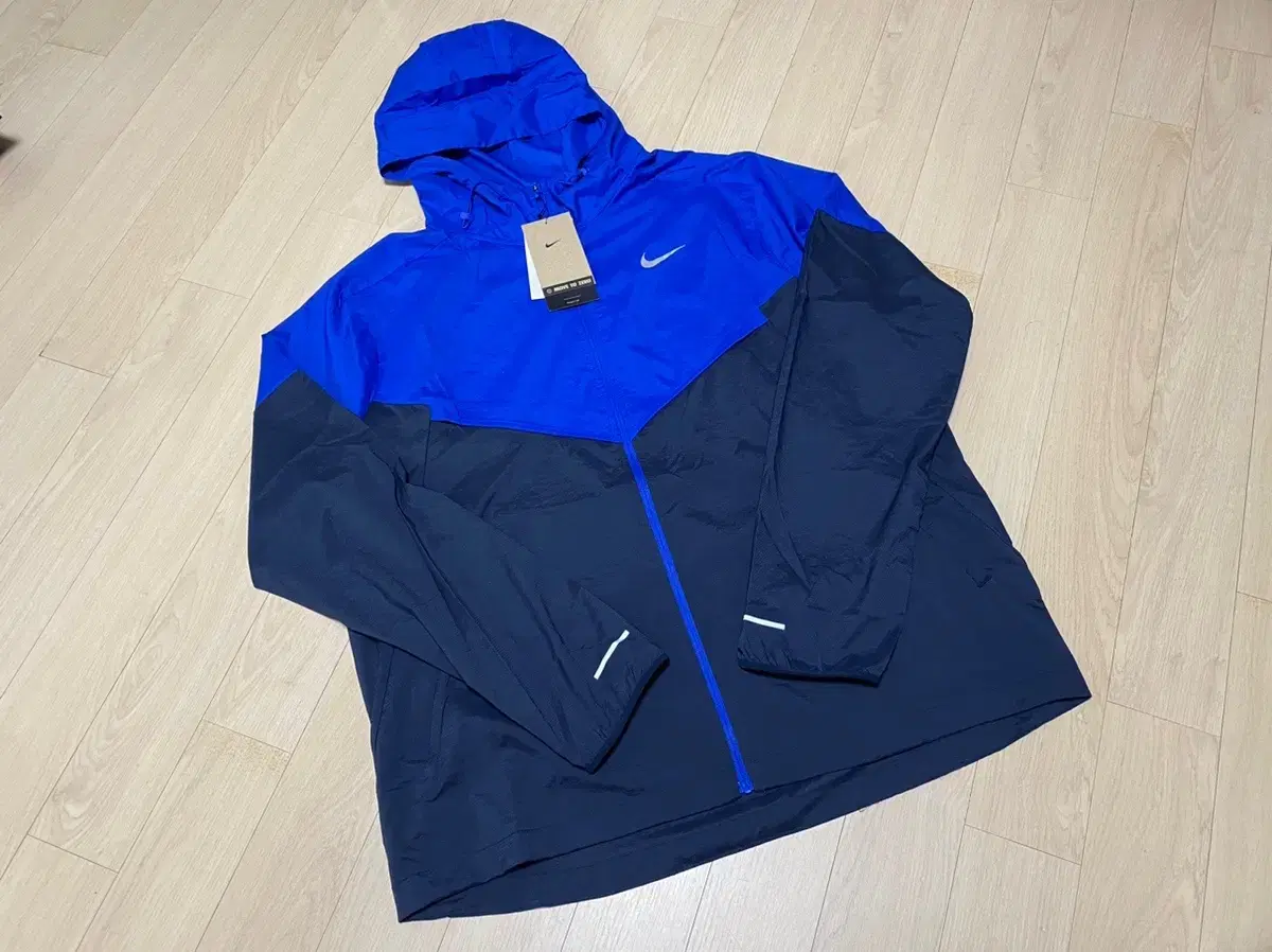 Nike Running bloo Functional Pocketable Windbreaker/ XL