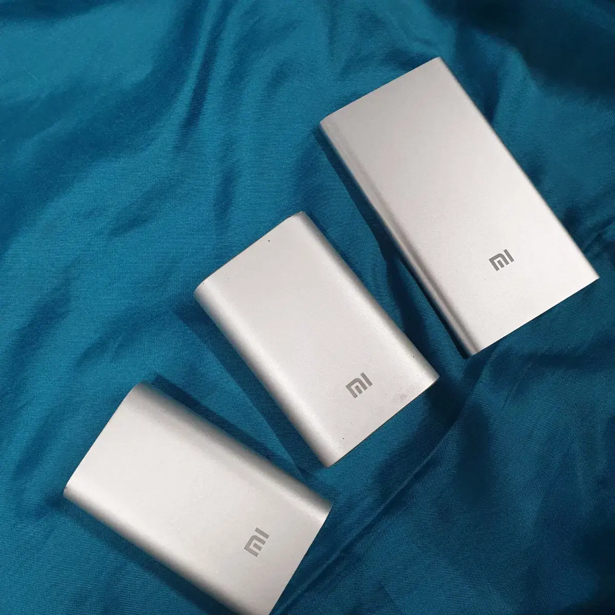 Three genuine Xiaomi power banks