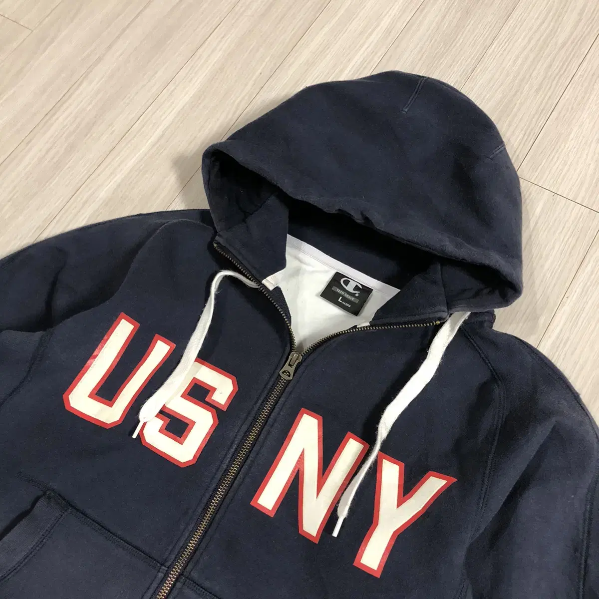 Champion hood zip-up. L