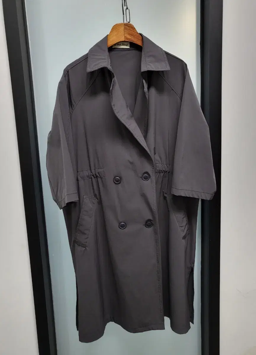 A well-woven trench coat