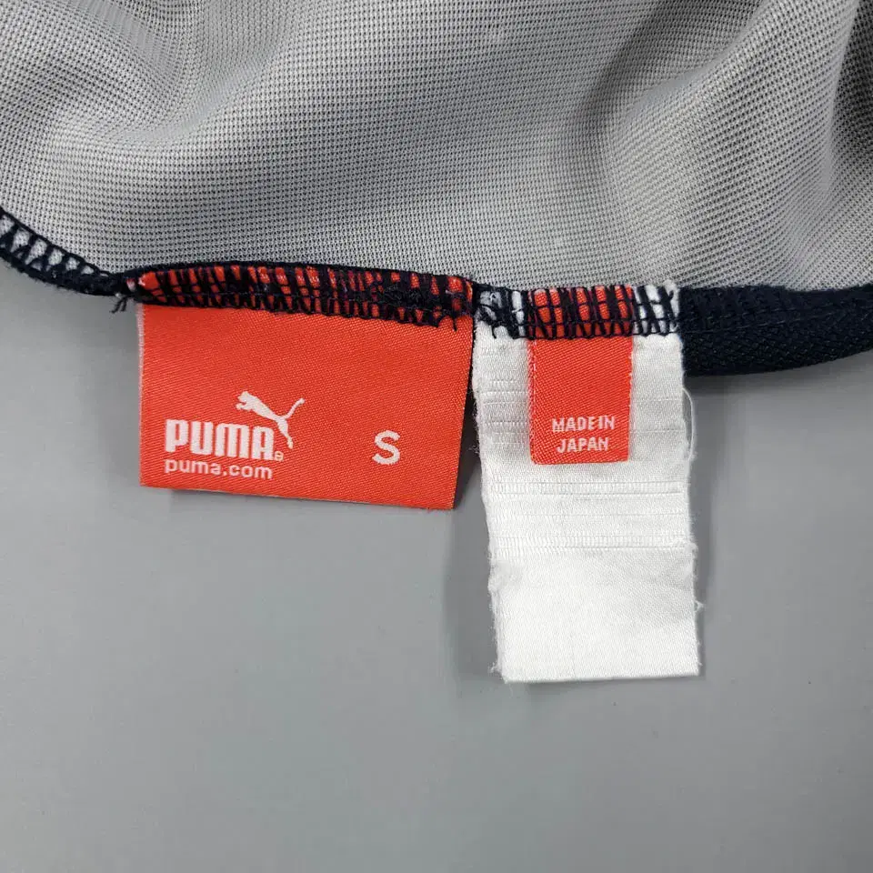 PUMA 퓨마 푸마 JP 딥네이비 오렌지 테이프라인 스트라이프 폴리 져지