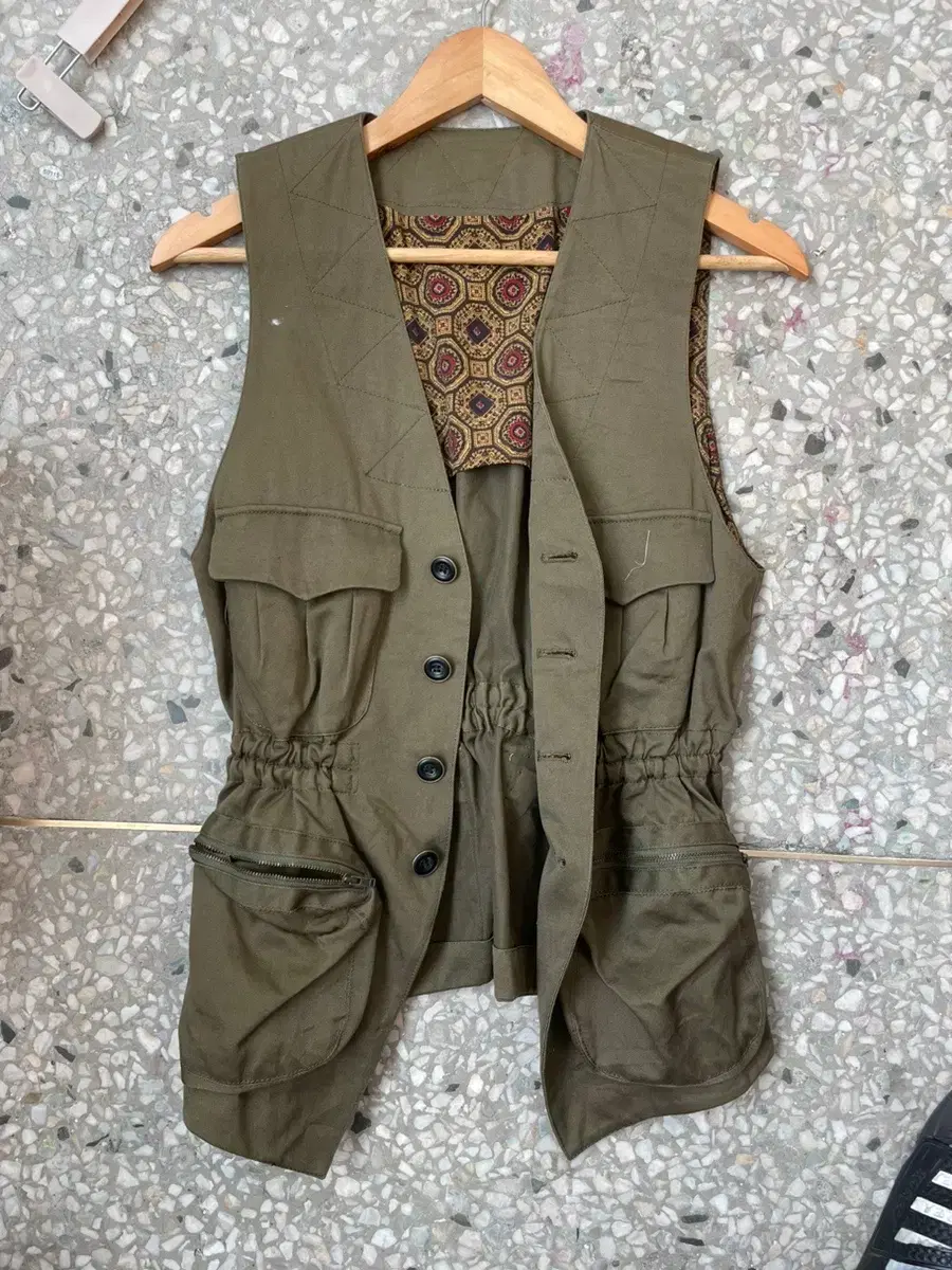 Sells vintage cargo vests.