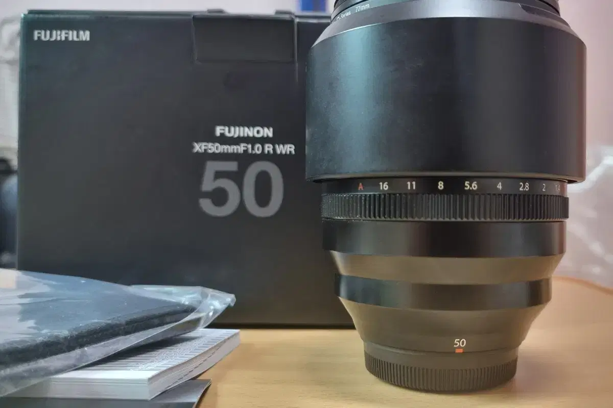 We are selling a Fujifilm 50mm f1 R WR lens.