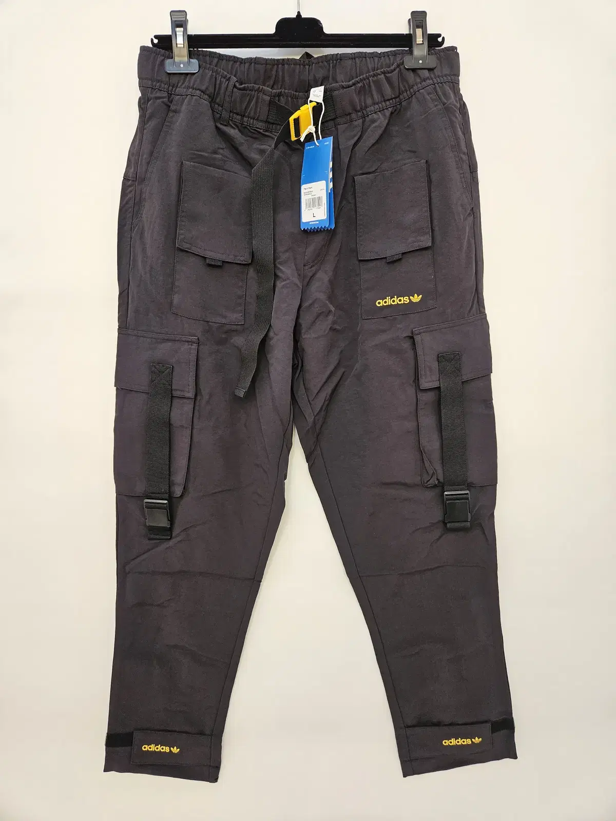 Adidas original nylon cargo pants (new) for sale.