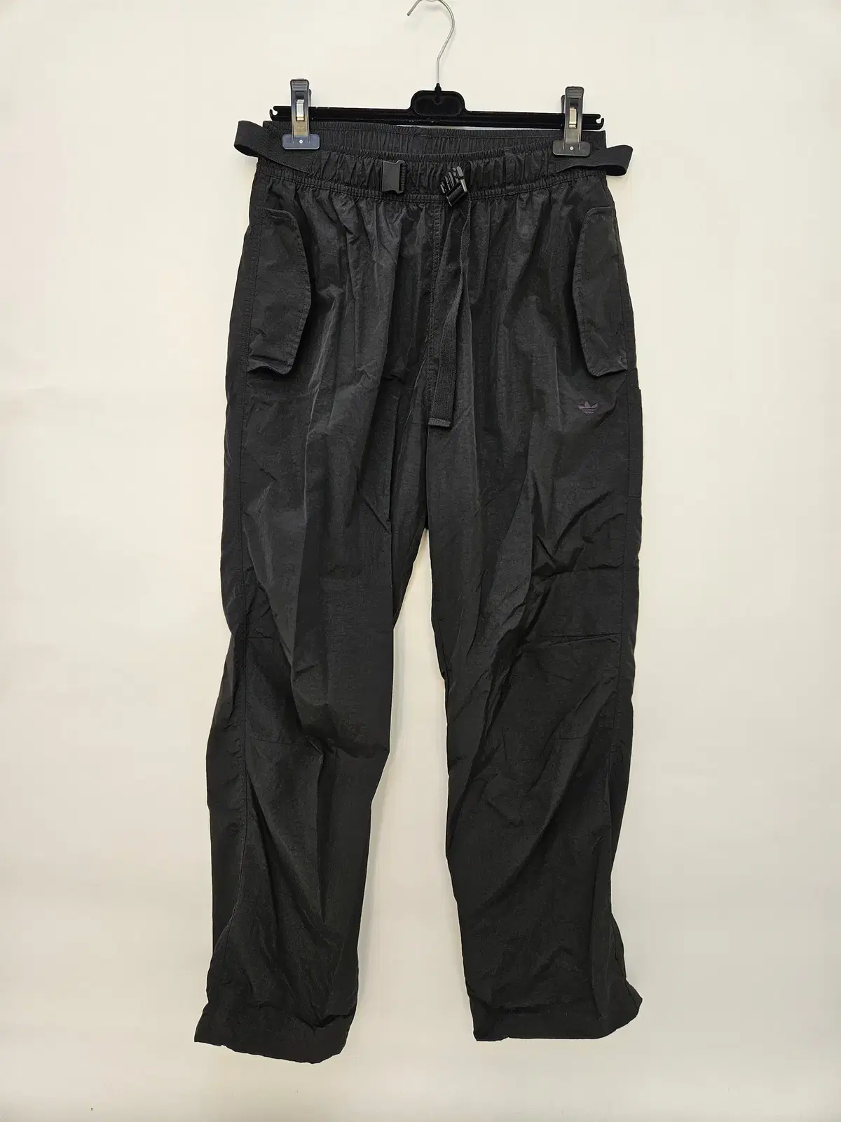 Adidas original belle nylon pants for sale.