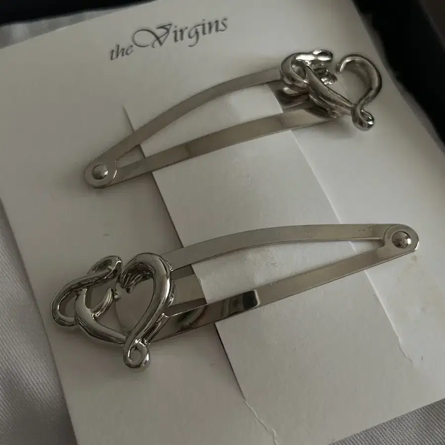 The virgins heart logo hairpin