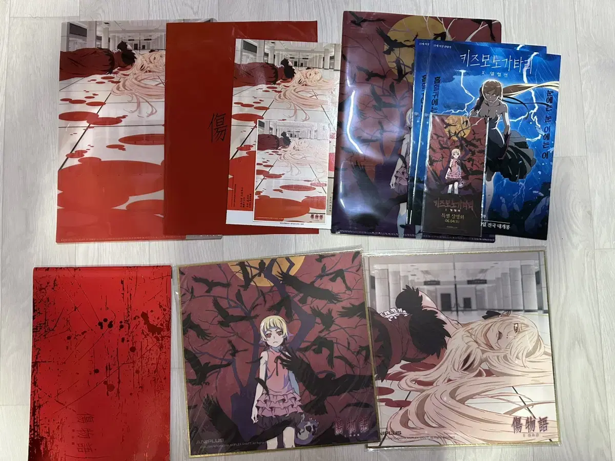 Kizumonogatari sells merchandise for the movie version of Hurt Story.