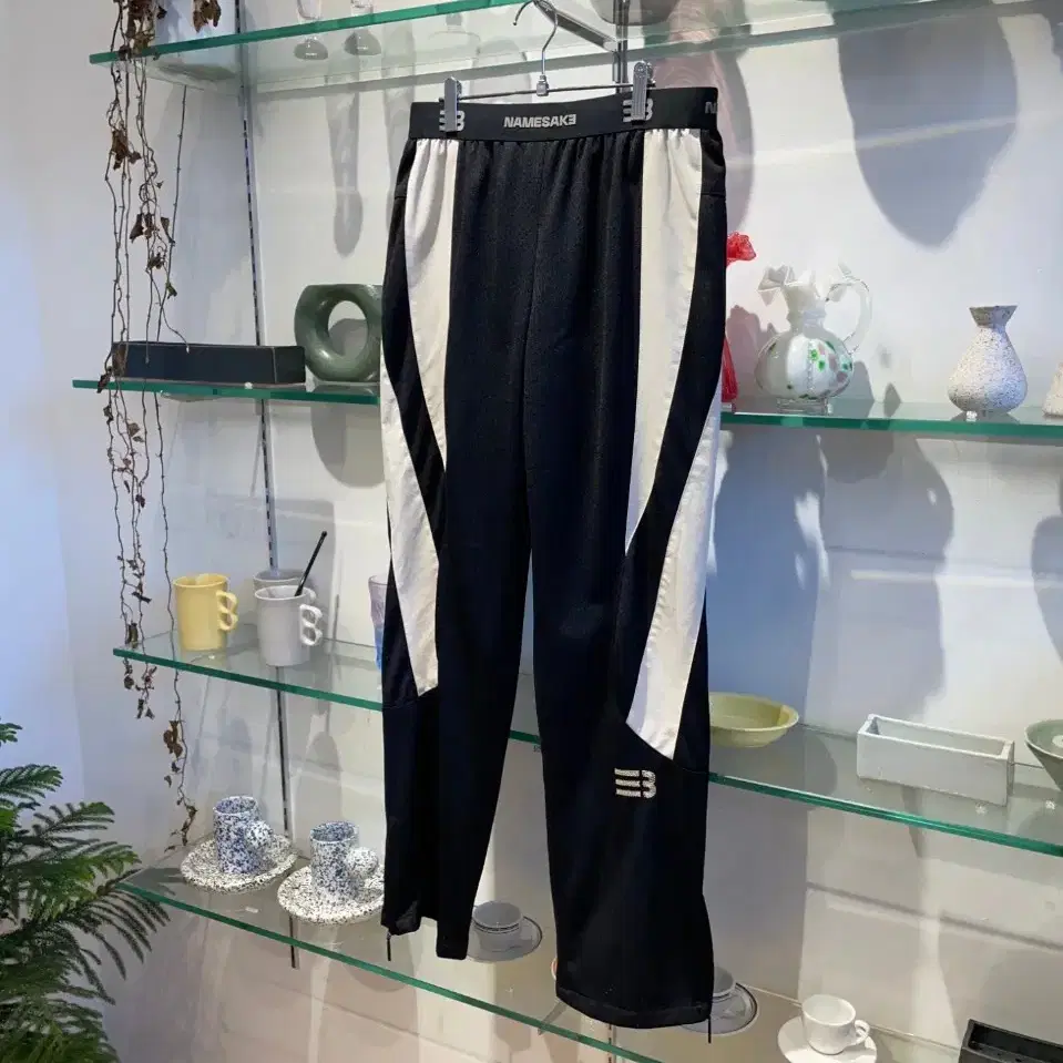 네임세이크 household warm up pants