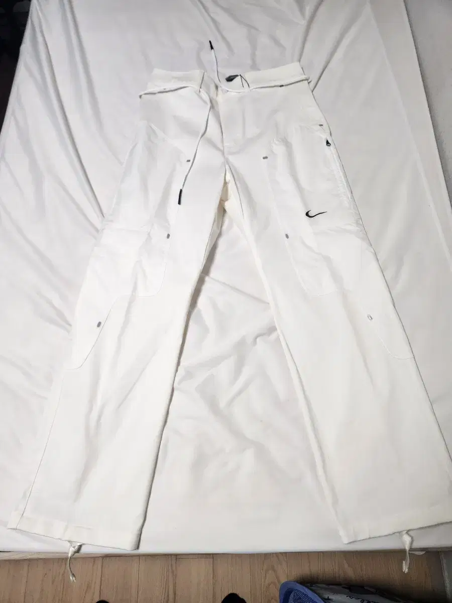 Nike off-white pants (white) for sale.