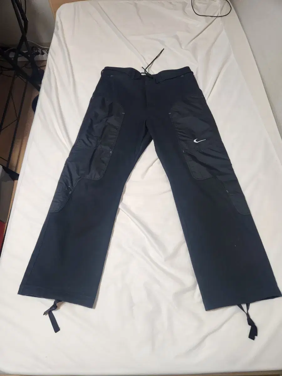 Nike off-white pants (black) for sale.