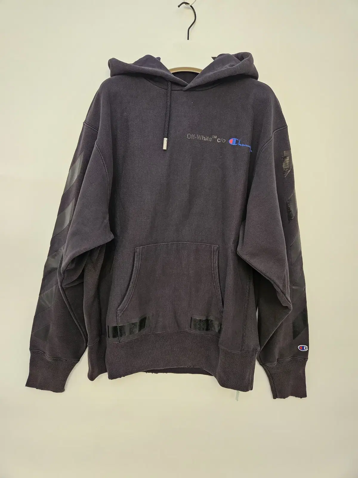 Off-White Champion Collaboration Overfit Hoodie for sale.