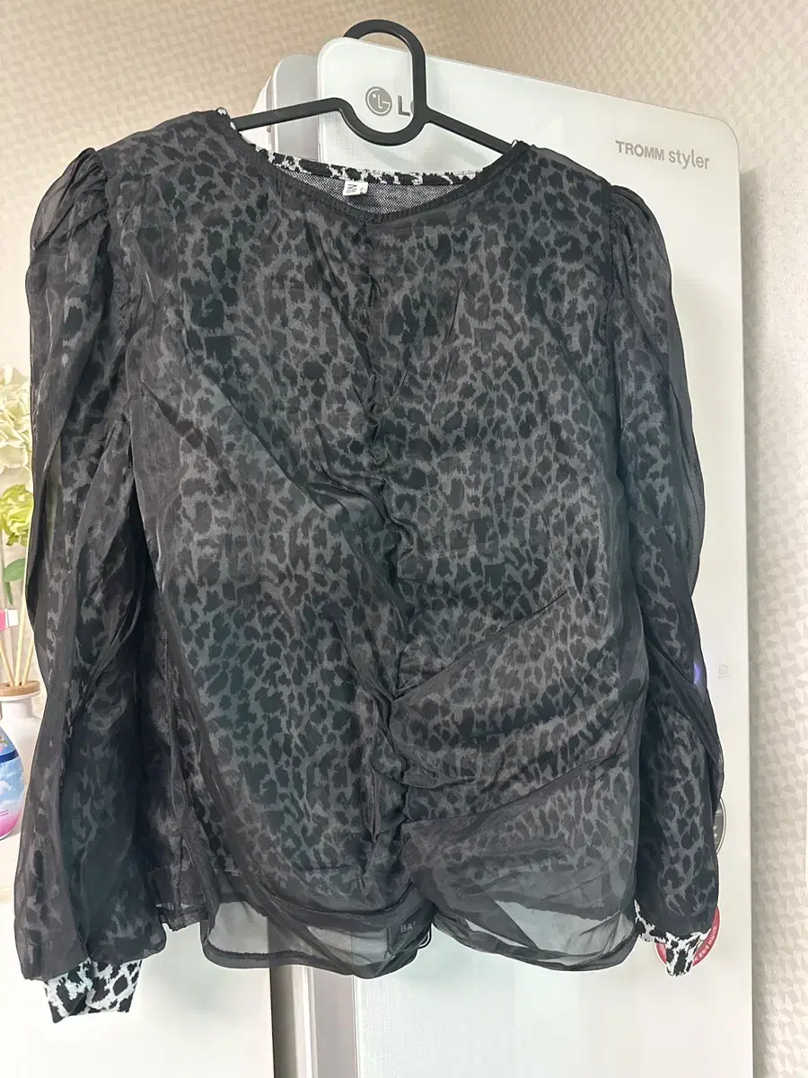 Faux layered leopard print top