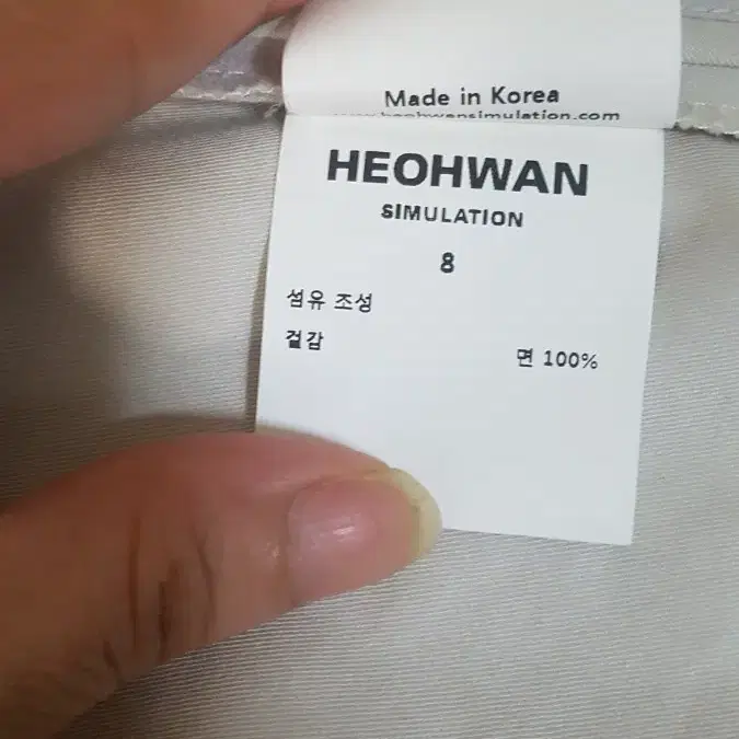 HEOHWAN박시한트렌치코트(팔통퍼브임)