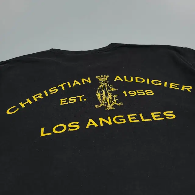 AUDIGIER CHRISTIAN 피그먼트 블랙 골드 레터링 해골 스컬