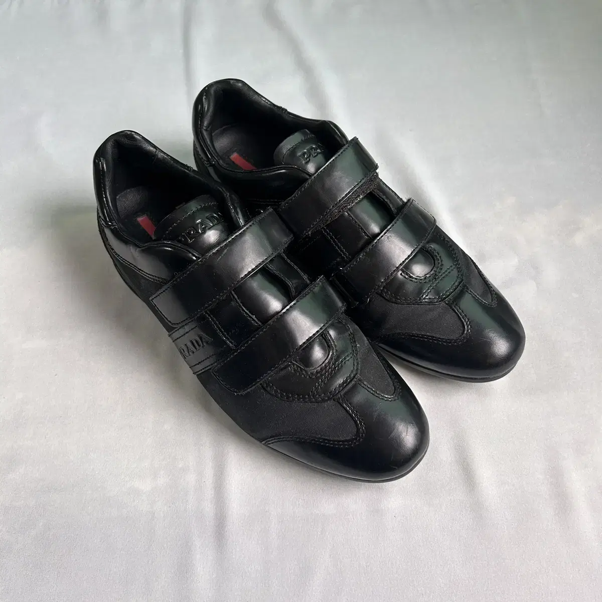 Prada strap flat leather shoes