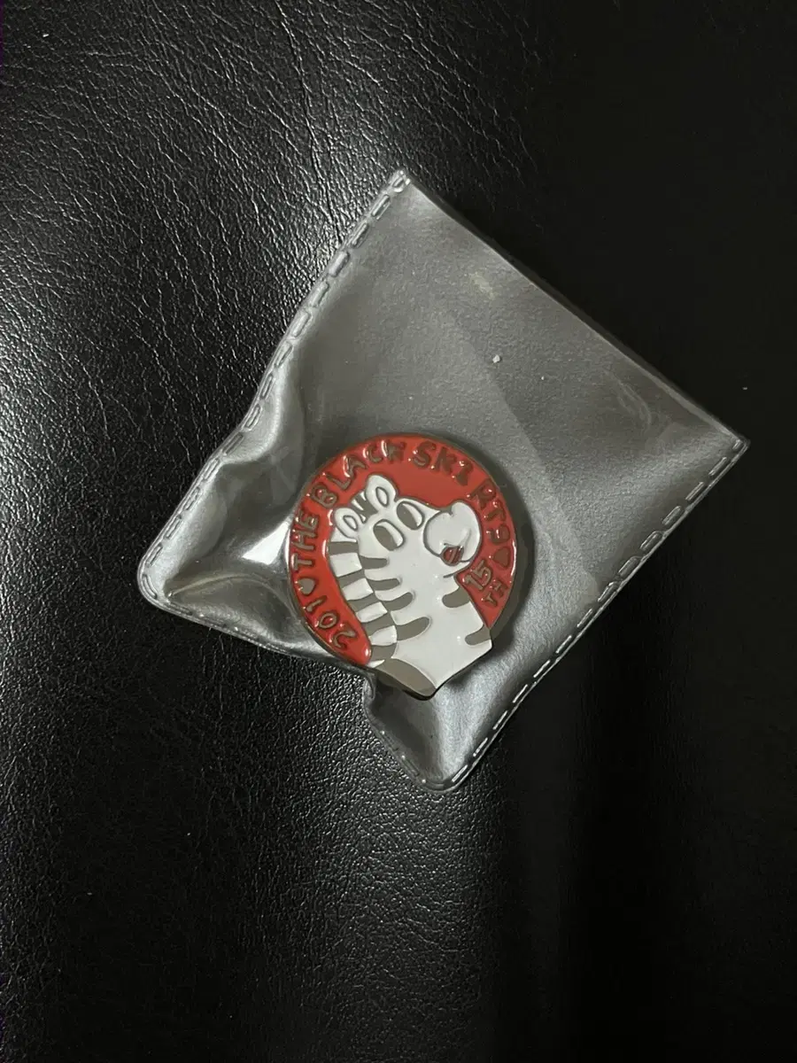 Black Skirt 201 10th Anniversary Badge