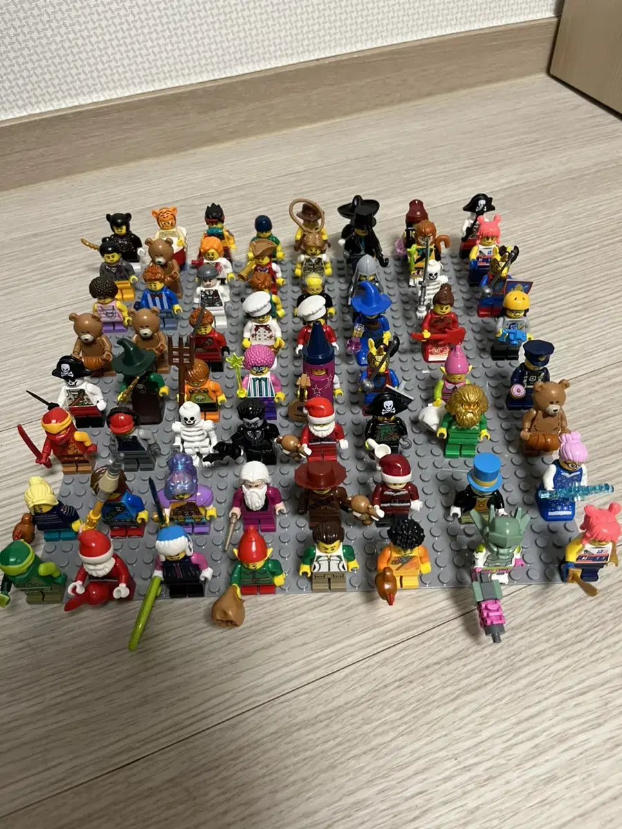 64 LEGO minifigures in bulk