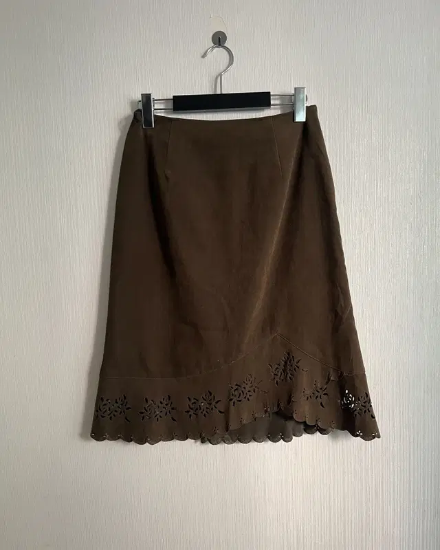 Punching suede midi skirt