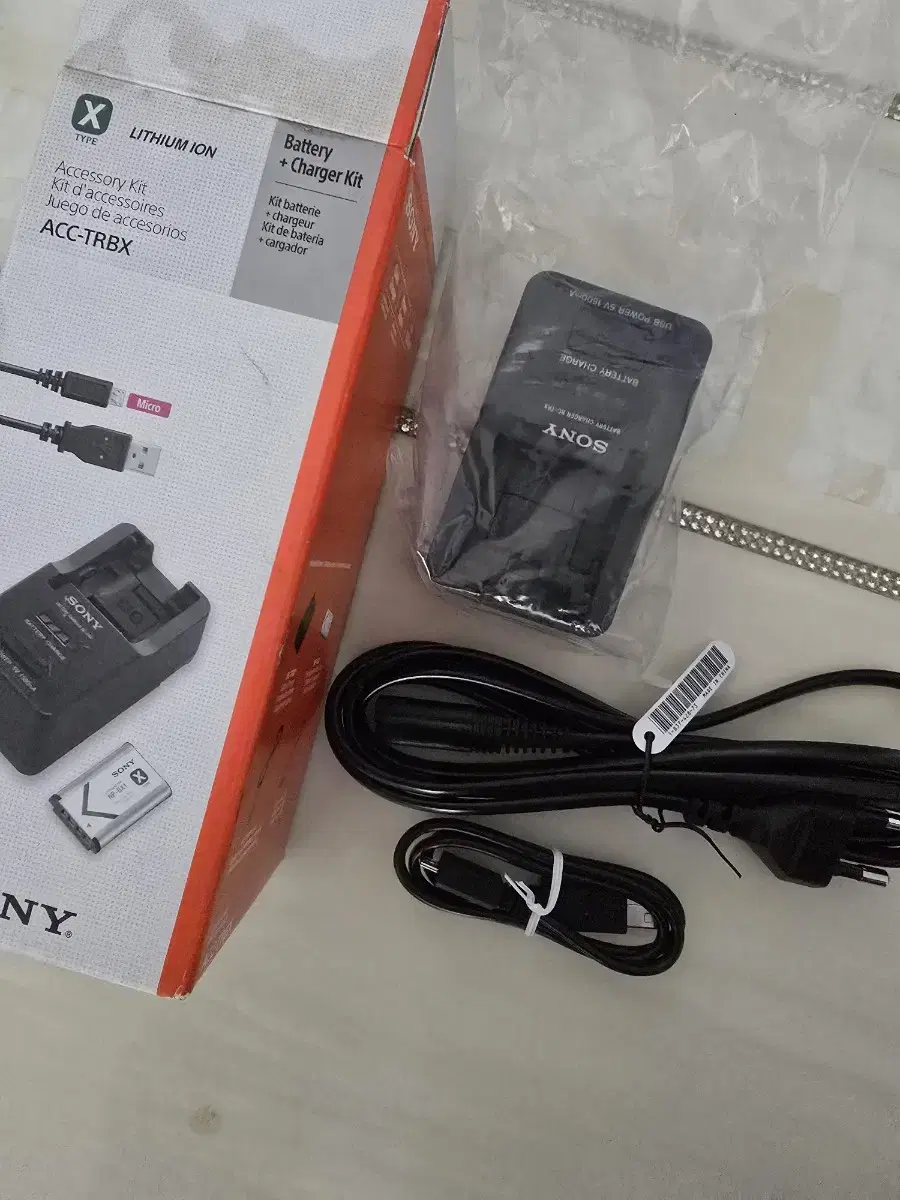 Unsealed, New) Genuine Sony ACC-TRBX Charging Kit + X-type Battery