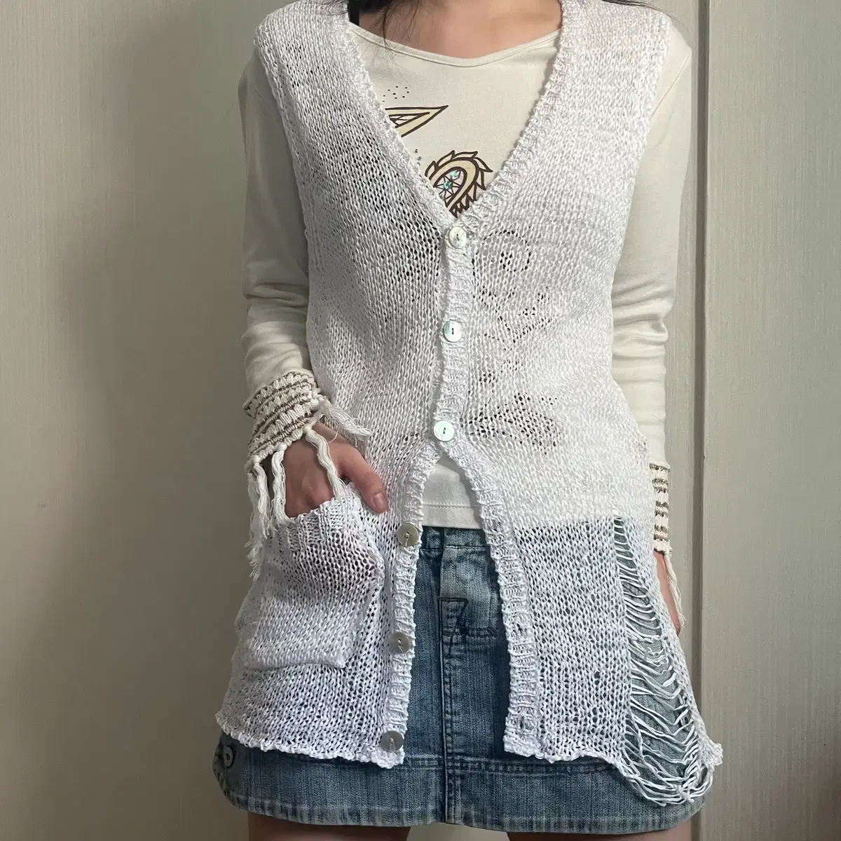 Damage point net sleeveless cardigan