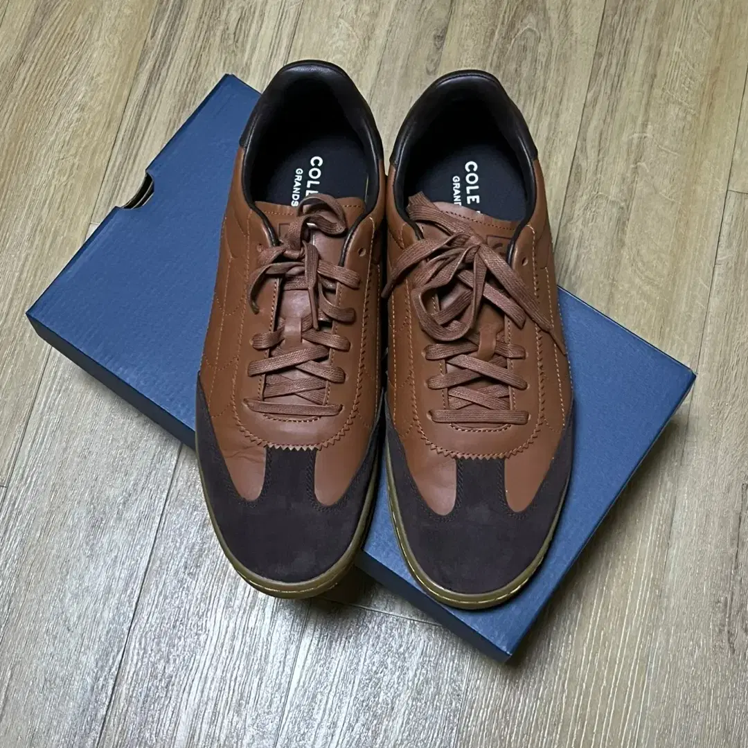 콜한(COLE HAAN) 그랜드프로 스니커즈 독일군