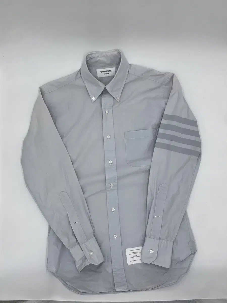 1) Thom Browne Diagonal Arms Shirt